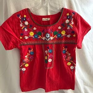 Red Spanish style embroidered shirt